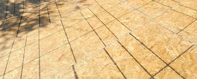 Exposed roof sheathing with layout marks