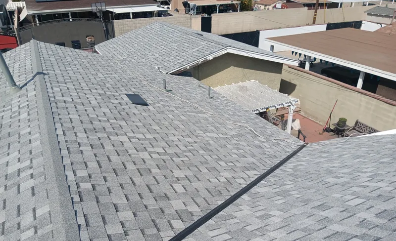 Gray asphalt shingle roof viewed from above