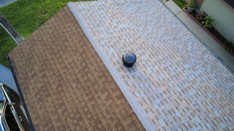 Two-tone asphalt shingle roof viewed from above